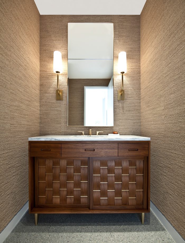 We made this extraordinary bathroom vanity. Basket weave doors in solid walnut and brass.  Vinci Hamp Architects